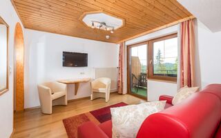Zimmer mit Sitzgelegenheit